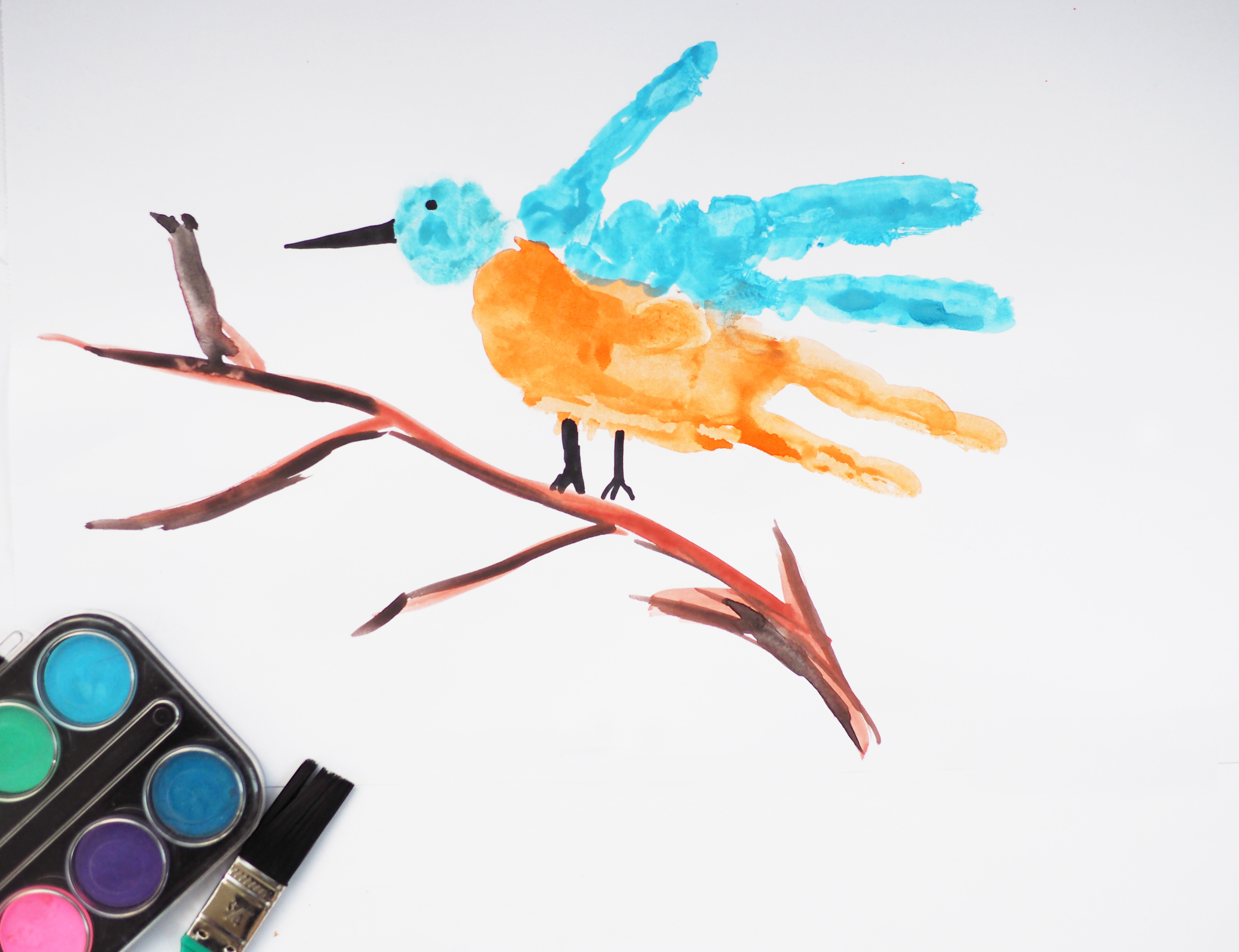 Aktionsidee "Eisvogel mit der Hand drucken"