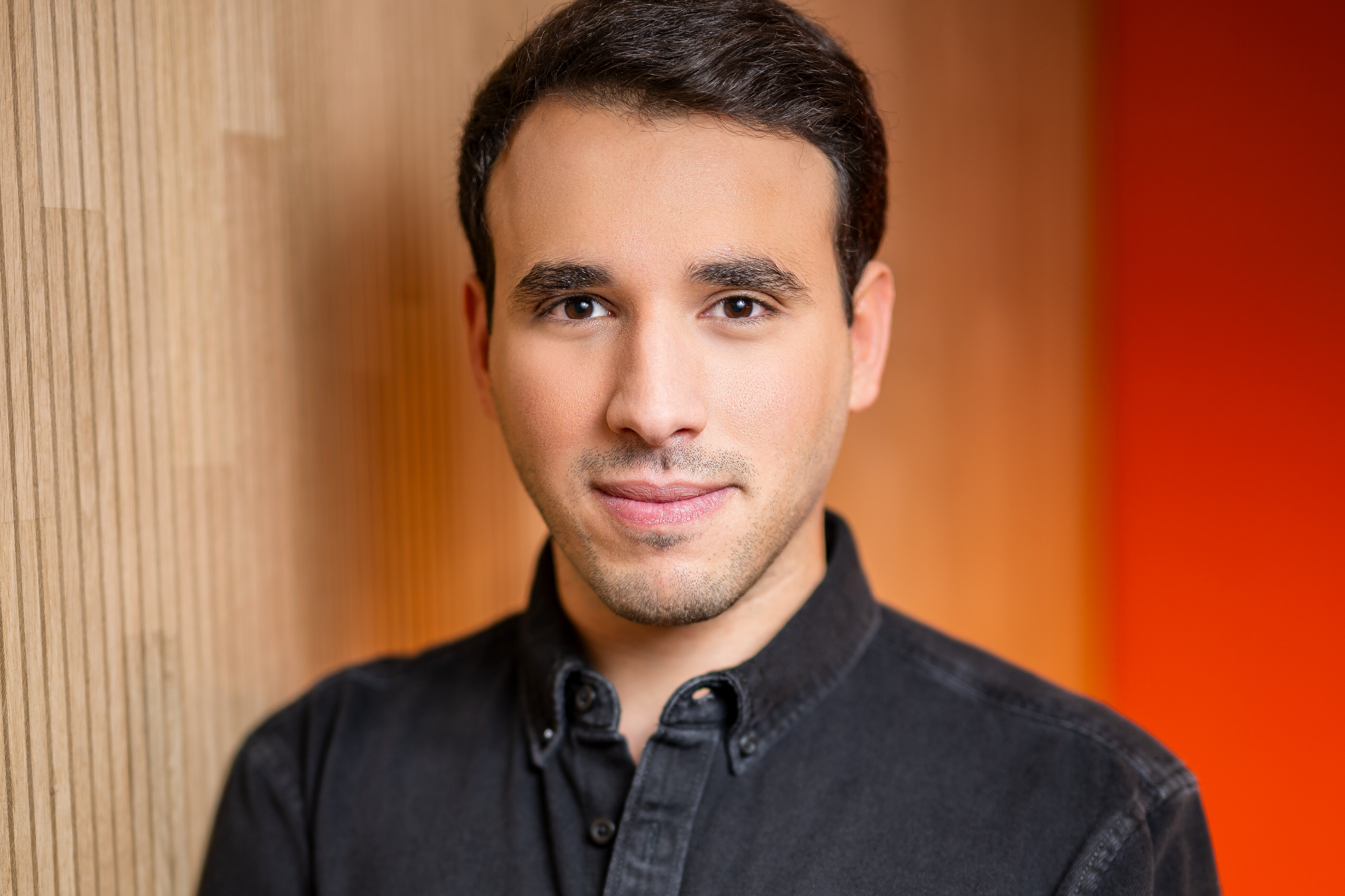 Porträtfoto von Moderator Sherif Rizkallah