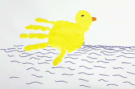 Aktionsidee "Ente mit der Hand drucken". Stiftung Lesen 